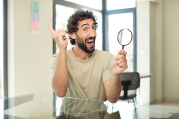 bearded hispanic man with a magnifier