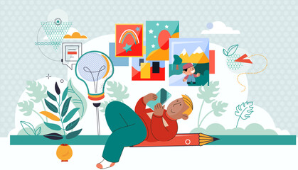 Creative ideas and technologies concept. Smiling boy lying with smartphone with flying ahead ideas and creative things. Child playing game on phone. Watching online drawing lesson, looking at pictures