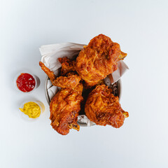 Bucket of fried chicken with overhead view