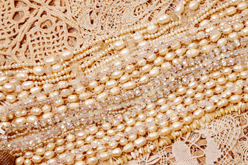 pearl necklaces on the crocket background