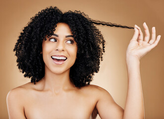 Curly hair, strand and woman in studio for beauty, healthy growth or natural coil textures on brown...