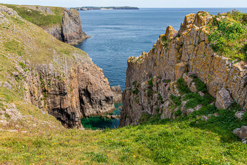 A view of the cliffs towards Lydstep Point from Skrinkle Haven, Lydstep in the Pembrokeshire Coast National Park, West Wales UK