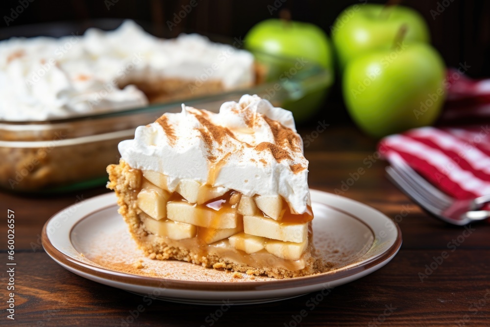 Poster freshly whipped cream on a slice of apple pie