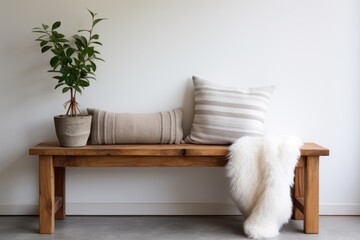 a wooden bench in an entryway with fluffy pillows