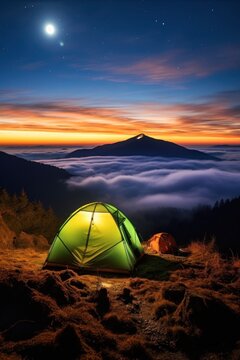 rakhiv district, carpathians, chornohora, tent on mountain meadow at dusk