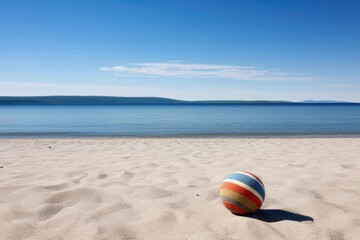 deserted beach with a lone beach ball