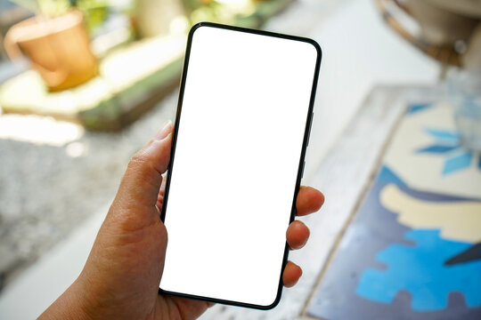 hand holding smartphone with blank screen white blank screen smartphone moke up smartphone