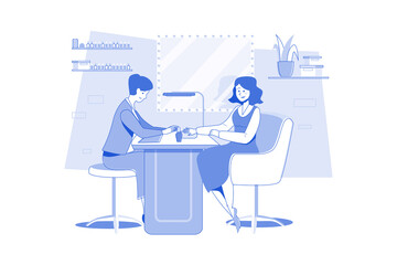 Woman in a nail salon receiving manicure by beauticians.