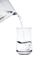 Pour water into a glass.