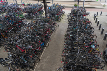 Hundreds of parked bicycles at the bike parking lot in Netherlands