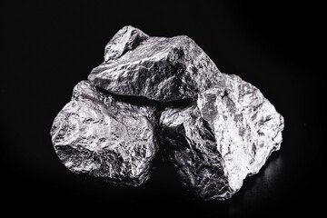 silver nugget native to Liberia isolated on black background.