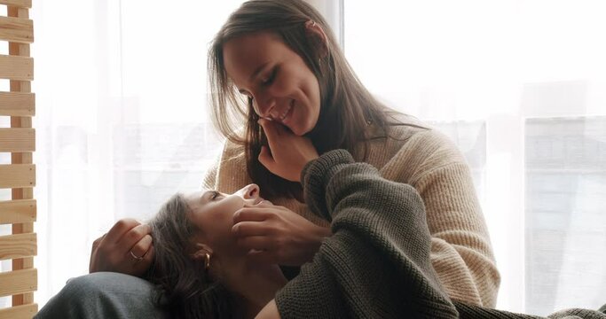Close up look at face. look in the eyes in love. lgbt and lesbian women at home. Embrace and holding each other. Love and kiss, Romance and portrait of lesbian couple enjoying. LGBT rights.