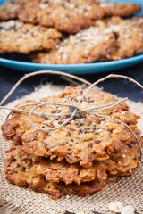 Fresh baked oatmeal cookies with honey and healthy seeds. Delicious crunchy dessert