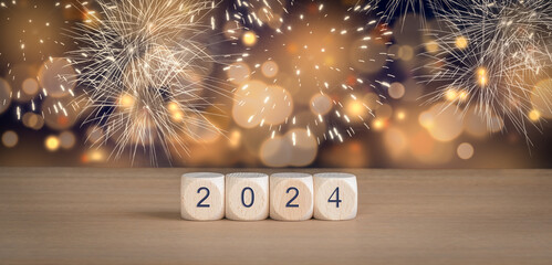 2024 New Year Celebration concept with fireworks and blurred lights background. - obrazy, fototapety, plakaty