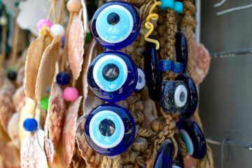 Wall ornament with evil eye bead detail.