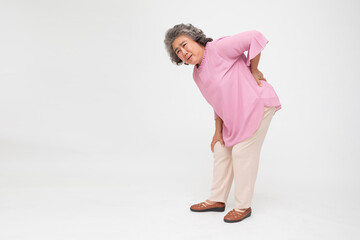 Asian senior woman with back pain isolated on white background, Spinal degeneration or Dislocated back bone herniated spinal disc concept