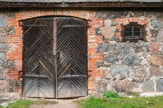 Gate to a stone barn.