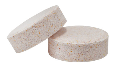 Tablets, round shaped vitamins on a white background. Medicines