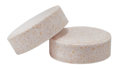 Tablets, round shaped vitamins on a white background. Medicines