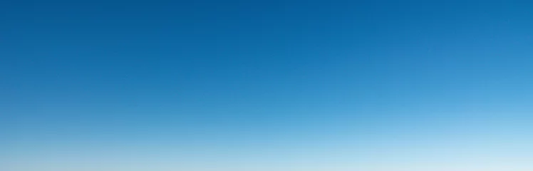 Zelfklevend Fotobehang Blue clear sky gradient background © Mikdain