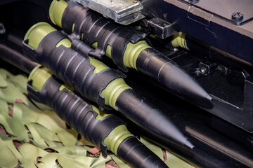 Close up of of bullets 11,8mm caliber in a coaxial machine gun, exposed at Military equipment international exhibition in Belgrade