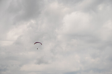 parachutist in the sky above the mountains in the valley, active recreation in the Ukrainian...