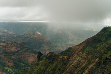 Canyon Lookout is a poplar area for visitors to Kauai's colorful canyon. kauai, hawaii - sep 2022