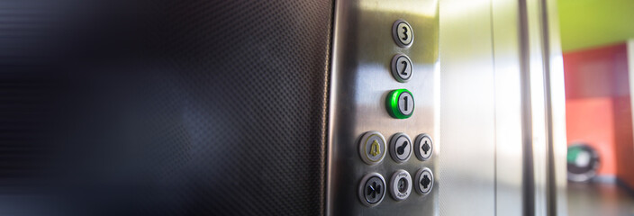 Metallic elevator panel © Daniel
