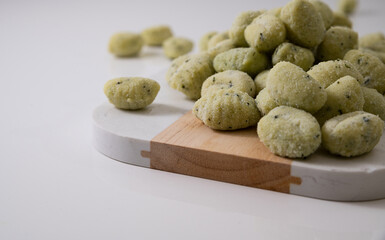 Italian gnocchi. Traditional Italian food. Handmade potato balls with parmesan and basil. Food for vegetarians and lovers of Italian typical cuisine. homemade pasta . High quality