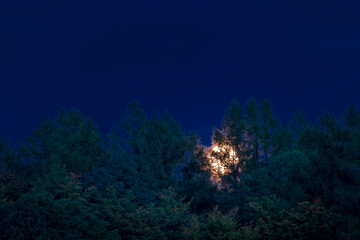 Naklejka na ściany i meble Moonrise view near Nemci village in Ceske Stredohori mountains