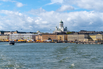 Helsinki city waterfront. Blue sky with some clouds.