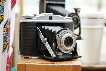 Fototapeta na wymiar A very old film camera from the last century.