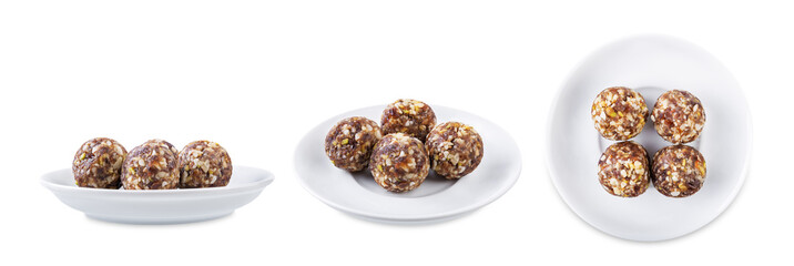 Dates and nuts raw healthy balls on a white isolated background