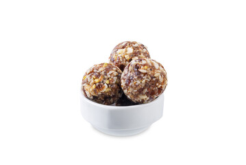 Dates and nuts raw healthy balls on a white isolated background