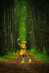 Woman in yellow raincoat