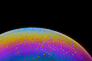 Closeup view soap bubble similar colorful, fantastic planet.