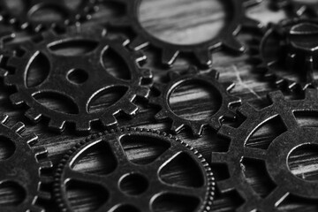 Steampunk gears on black and white background.
