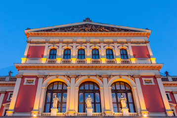 Philharmonic building at night illumination, Vienna, Austria