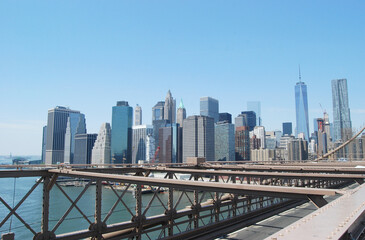 Beautiful view of the skyline of Manhattan as seen from the Brooklyn Bridge in New York City, New York, USA