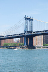The blue Manhattan Bridge as seen from Brooklyn in New York City, New York, USA