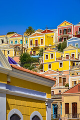 Fototapeta na wymiar Colorful houses village in Symi island, Dodecanese islands, Greece.