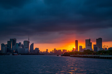 Naklejka premium City night view of Huangpu River in Shanghai, China