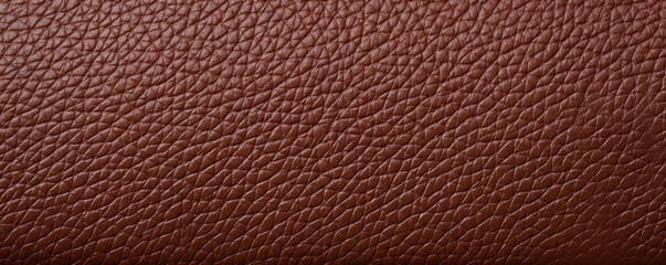 Fototapeta premium Closeup of a bonded leather with a subtle pebbled texture, adding a touch of elegance and depth to its appearance.