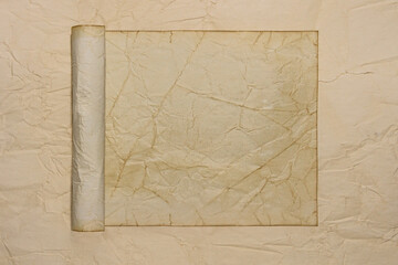 Retro torn aged paper. Scrolls, crumpled paper. Ancient monuments.
