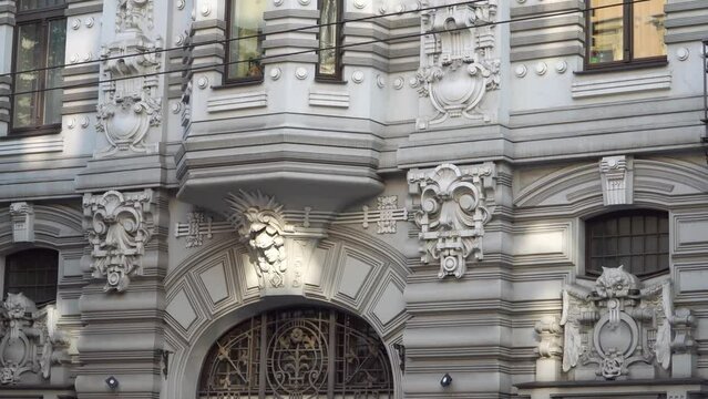 A historical building in Art Nouveau style, showcasing magnificent facade decoration with sculptural elements. It is a wonderful example of classic Art Nouveau architecture, known as Jugendstil.