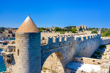 Mandraki port with deers statue, where The Colossus was standing and fort of St. Nicholas. Rhodes,...