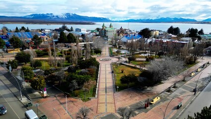 Plaza De Armas At Puerto Natales In Magallanes Chile. Snowy Mountains. Square Scenery. Magallanes...