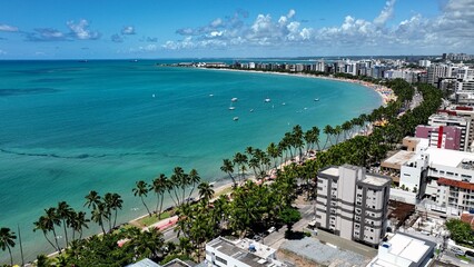 Maceio Alagoas Brazil at brazilian Northeast. Aerial panning shoot of turquoise water beach at Maceio Alagoas Brazil. Landmark beach tourism sights. Travel destination