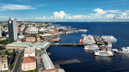 Downtown Manaus Brazil. Capital city of Amazonas State near Amazon river and Amazon forest. Tropical destination. Tropical travel. Tourism landmark.  Outdoors urban scenery downtown Manaus Brazil.