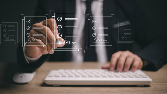 E-signing, electronic signature, document management, paperless office. Hand signing on e-document on a digital tablet, virtual notepad on virtual screen, Online contract signing with application